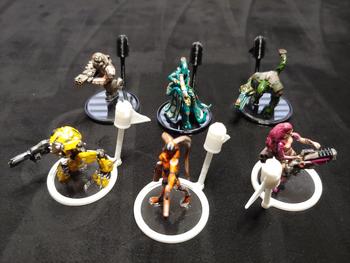 These are used in place of the expansion's team bases for our re-based miniatures.